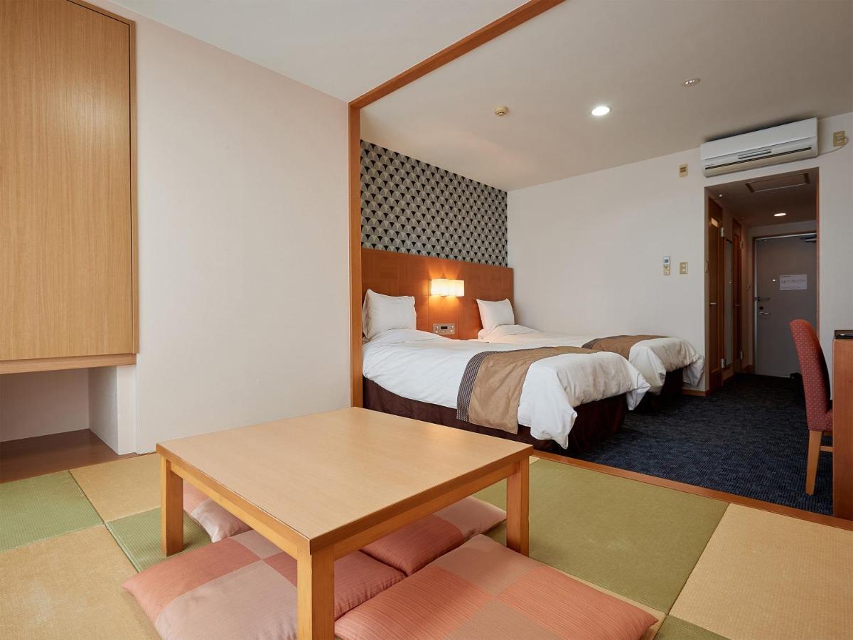 Hotel Murasakimura Yomitan Esterno foto