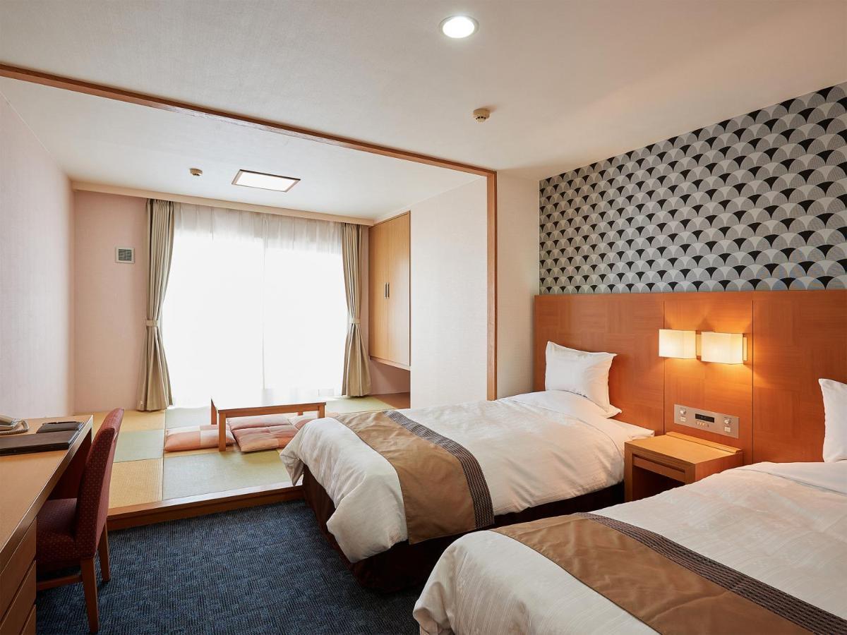 Hotel Murasakimura Yomitan Esterno foto