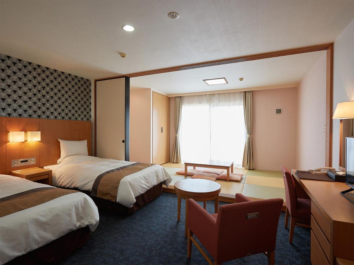 Hotel Murasakimura Yomitan Esterno foto