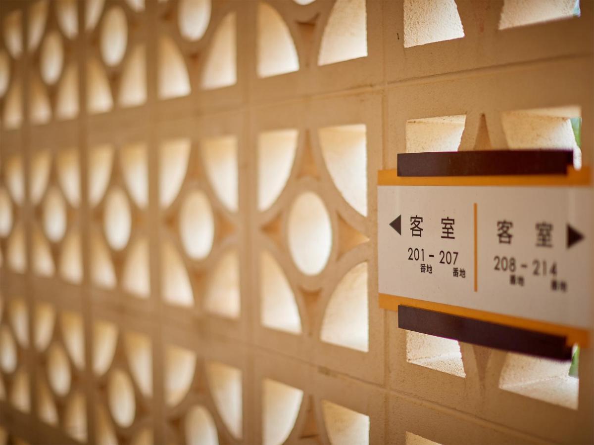 Hotel Murasakimura Yomitan Esterno foto