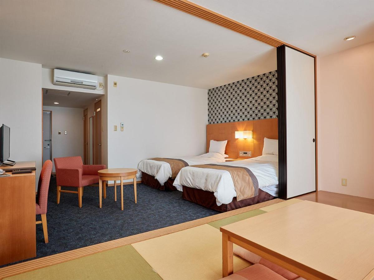 Hotel Murasakimura Yomitan Esterno foto